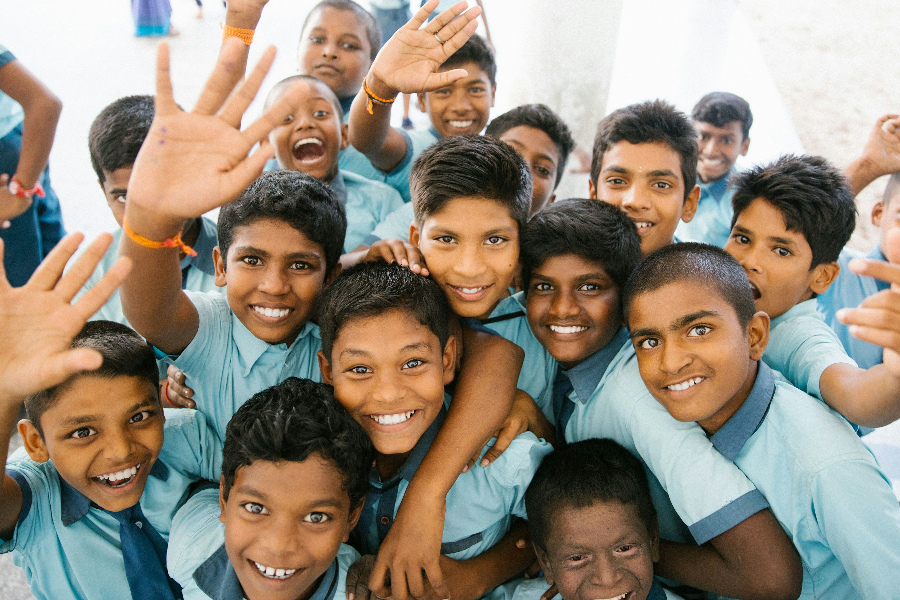 Group of happy students in a classroom